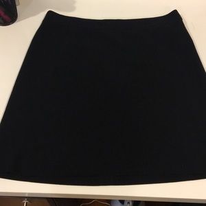 Adorable simple black mini skirt.